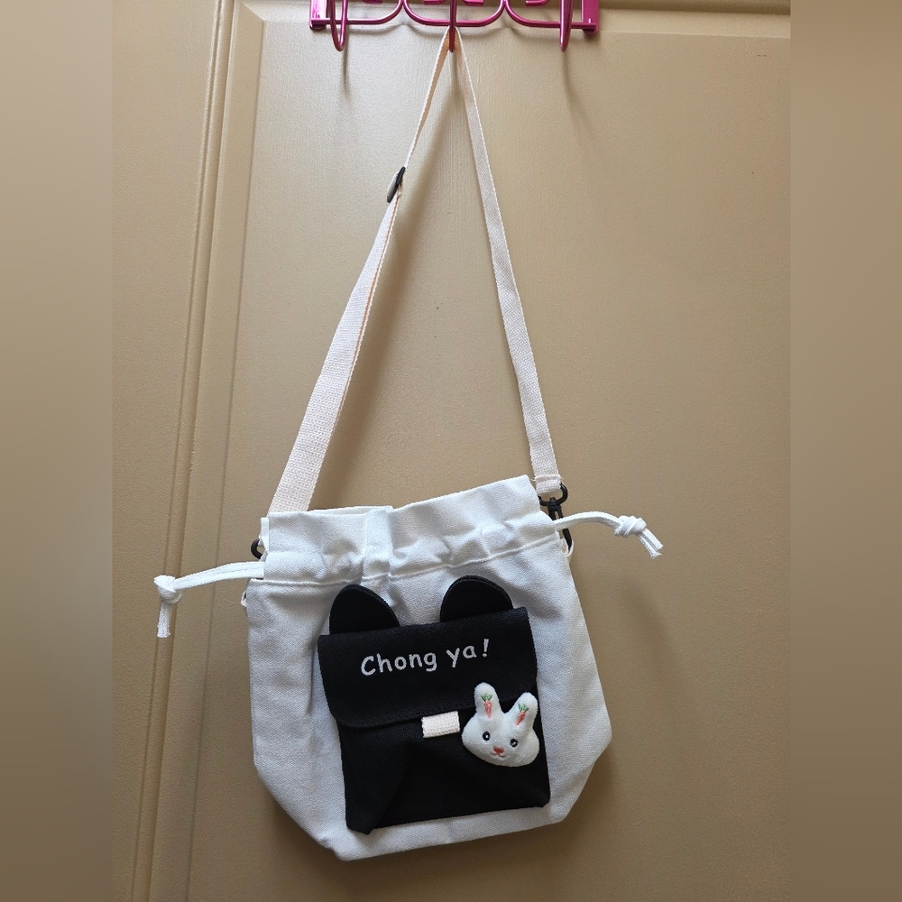 Brand New White Canvas Drawstring Crossbody Bag with Black Accent